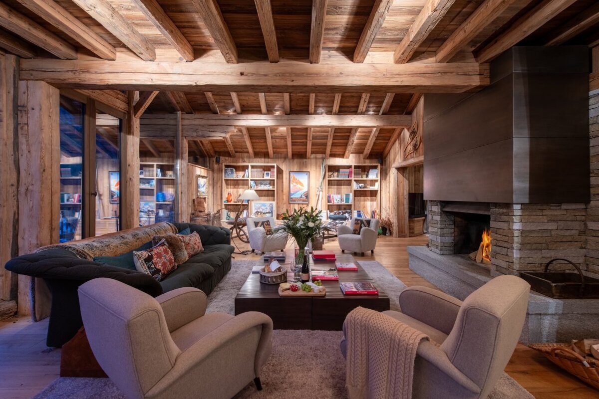 A living room filled with furniture and a fireplace