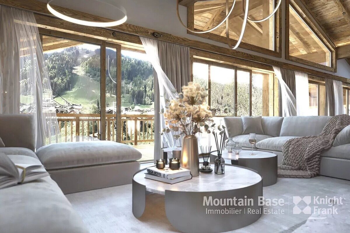 Elegant chalet living room with panoramic mountain valley views. Neutral tones, plush seating, and warm wood beams create a cozy, luxurious ambiance.