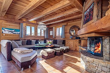 A living room filled with furniture and a fireplace