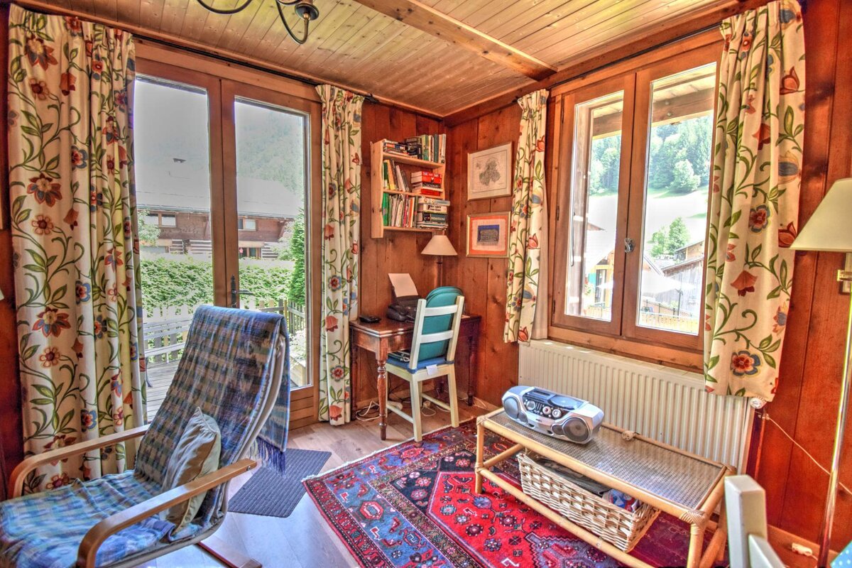 A room with a cd player on a table