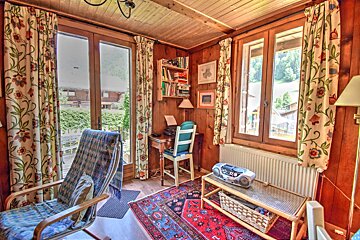 A room with a cd player on a table