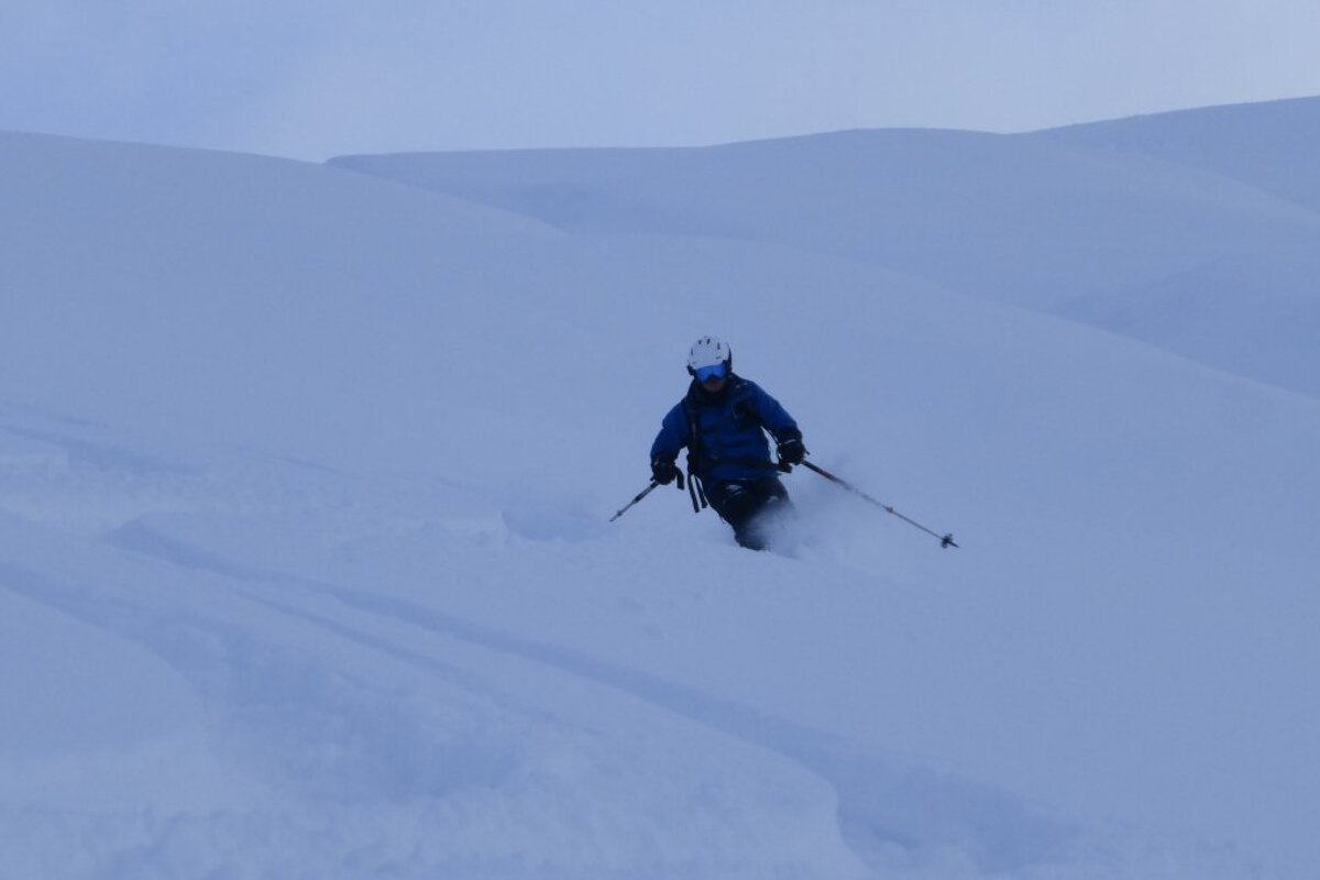 a skier in deep snow