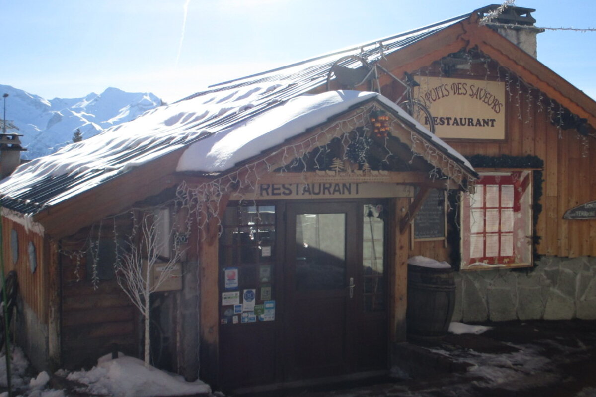 a chalet style restaurant in alpe dhuez
