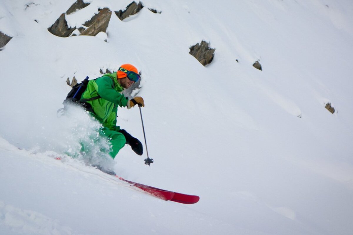 skier in green 