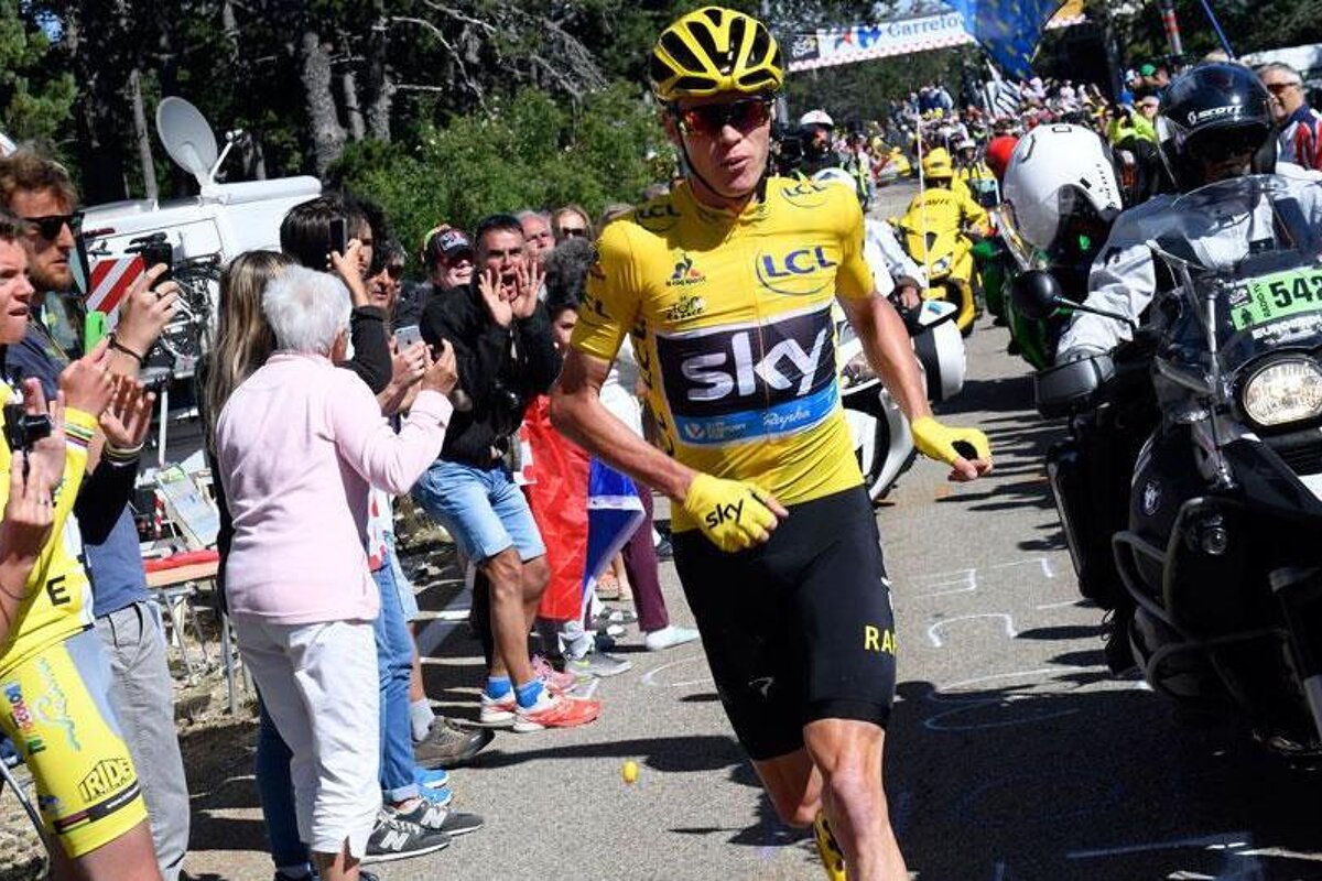 Chris Froome in yellow running up mont ventoux in provence, le tour 2016