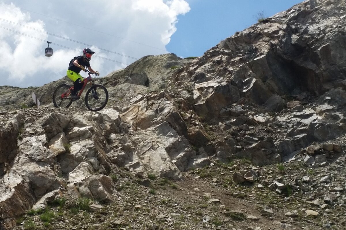 a mountain biker on some rocks
