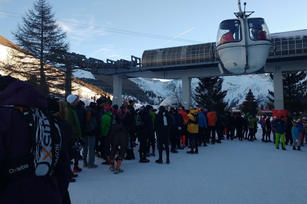 waiting for a lift up the mountain in les 2 alpes