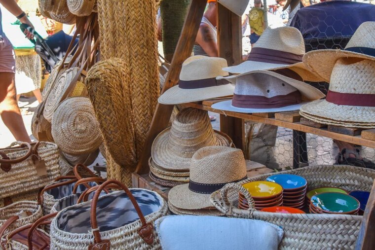 Hats, bags and more at the market in Artá