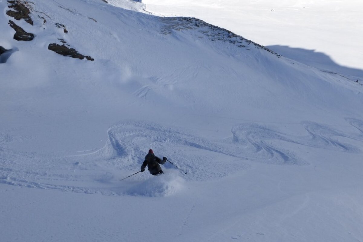 a skier in an off piste section