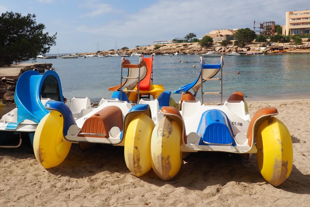 pedalos on the beach at port des torrent in ibiza