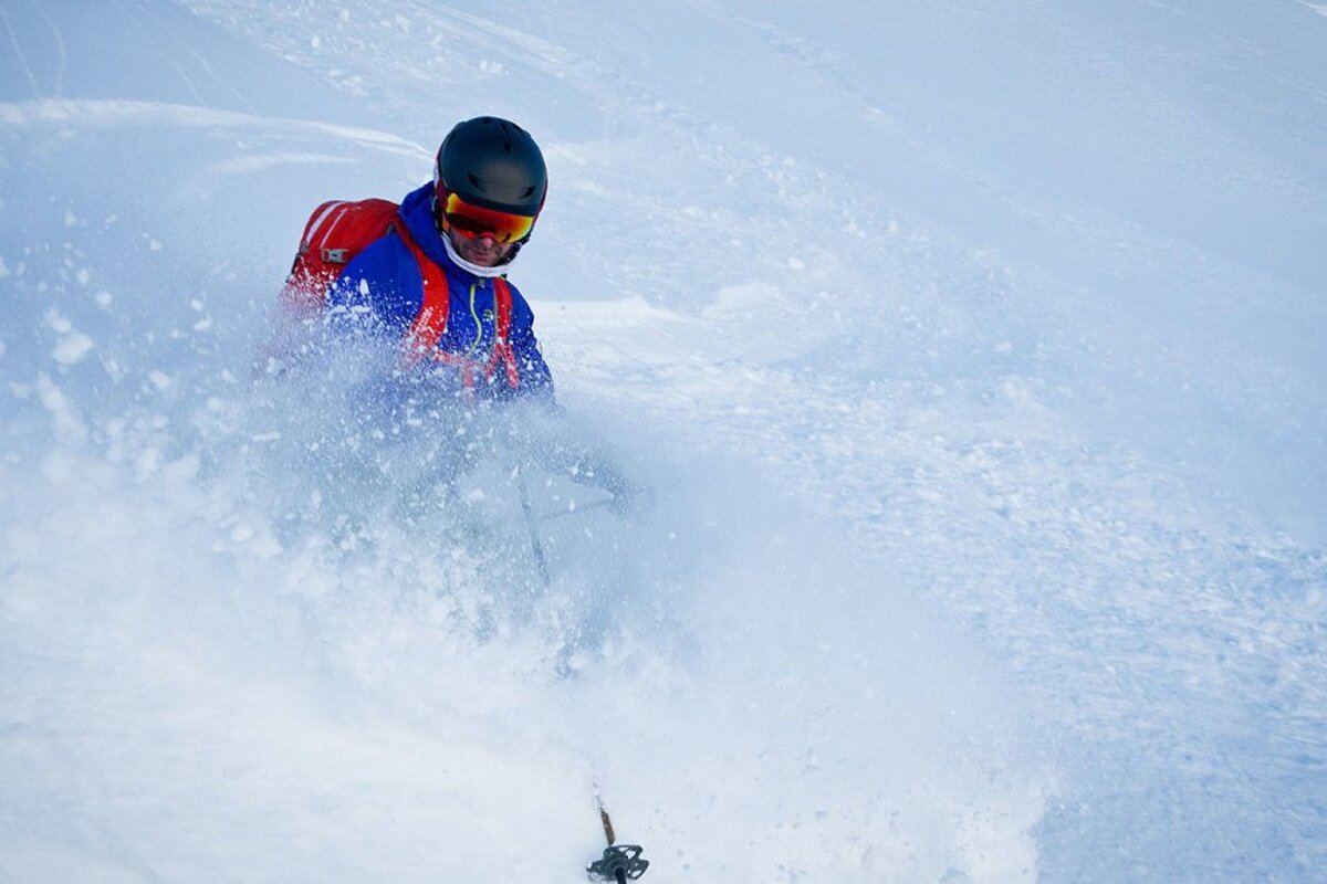 a skier in deep snow