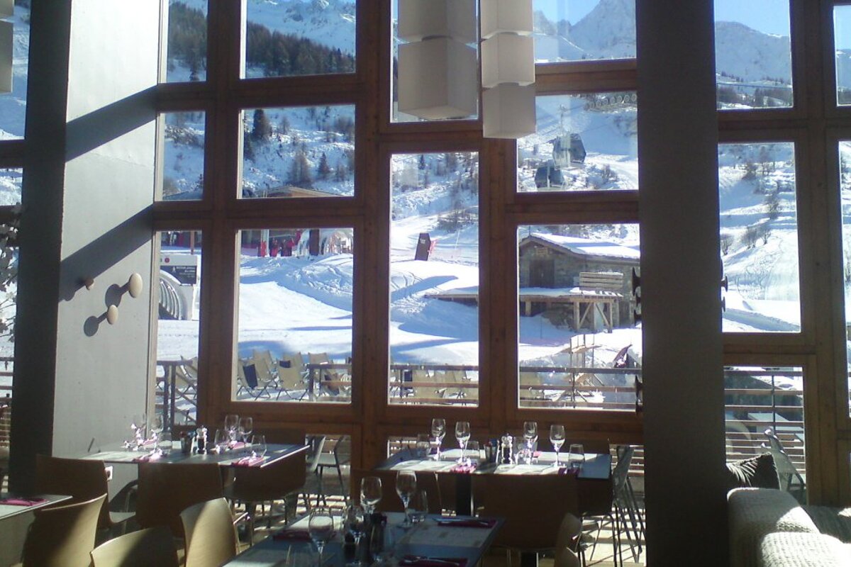 restaurant tables with a mountain view