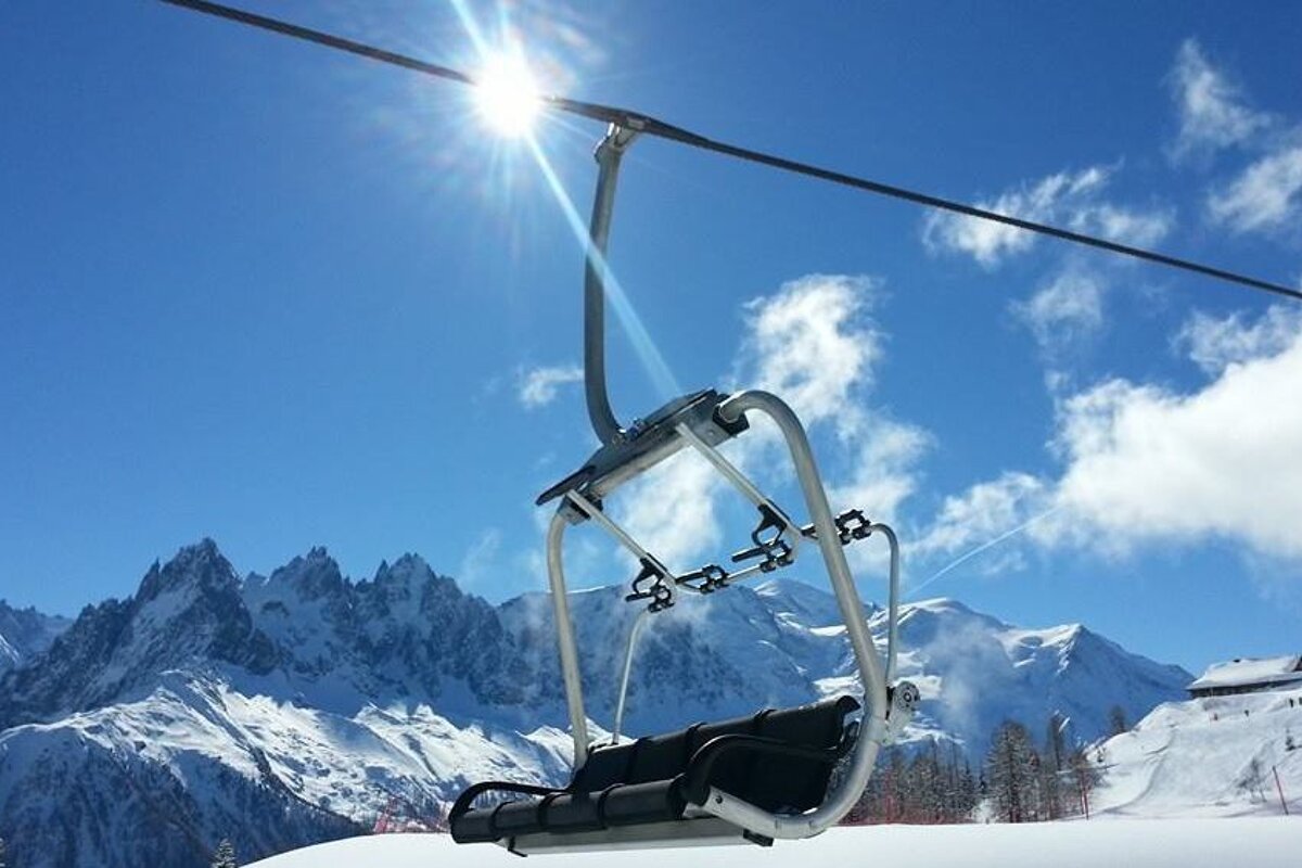 a ski lift in the sunshine