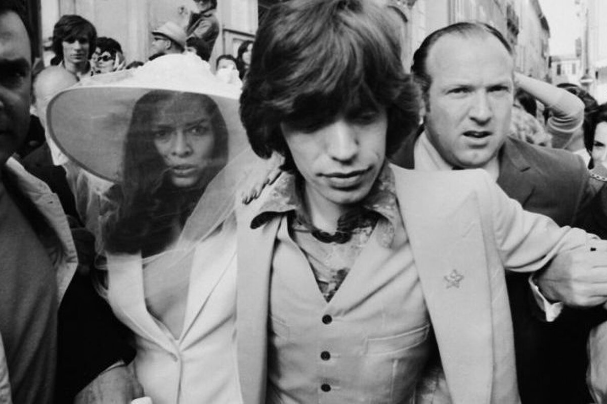Fighting the crowds after the weeding ceremony at St Tropez town hall - Mick & Bianca Jagger