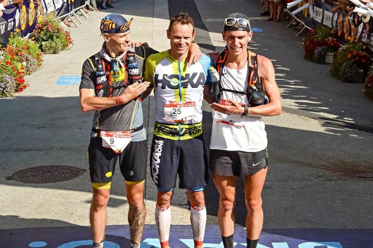 trail runners on the finish line