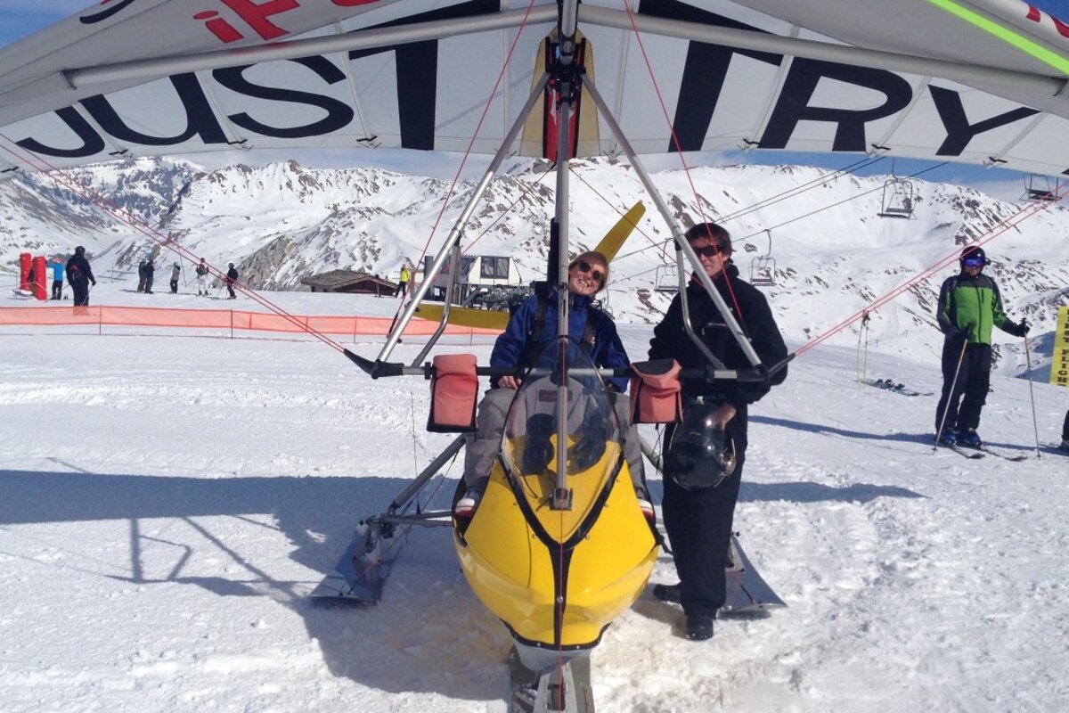 Microlight flight Microlight aircraft in the air above courchevel