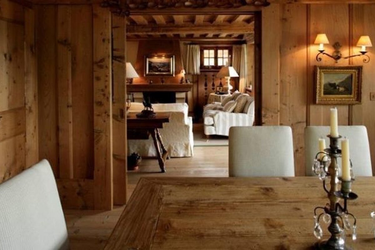the lounge and dining area in a chalet in Verbier