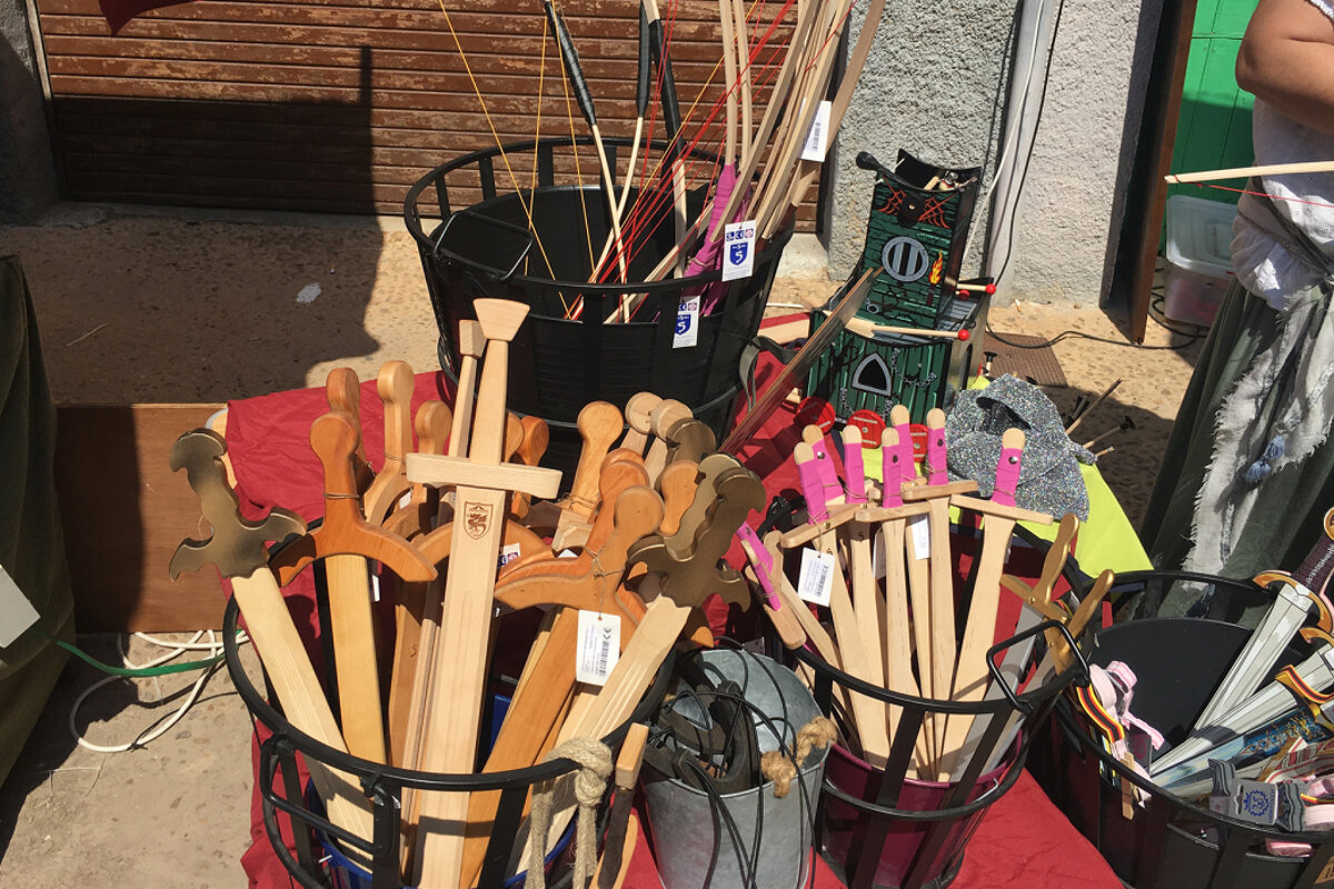 wooden toys hand crafted for kids at Capdepera medieval fair mallorca