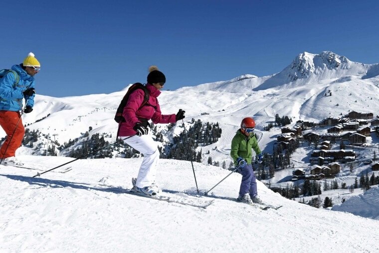 Family skiing in La Plagne