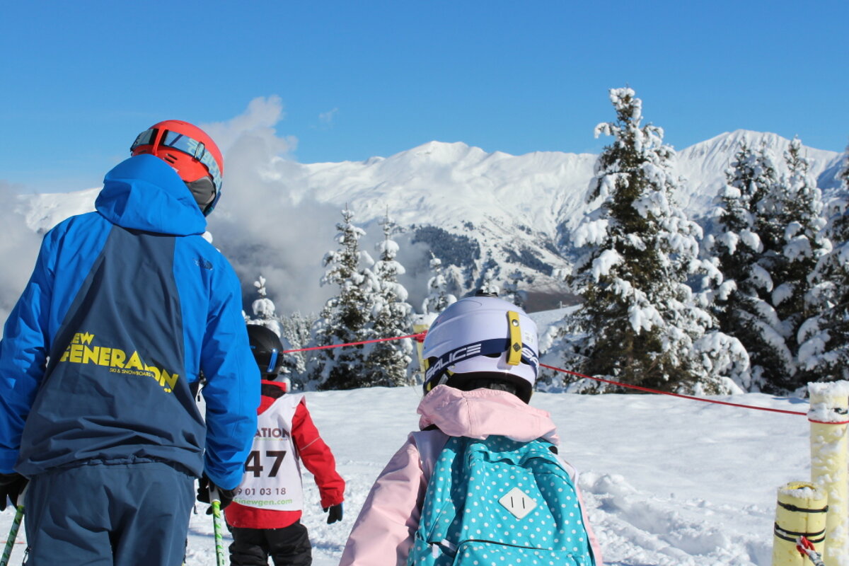a ski instructor with kids on a lesson