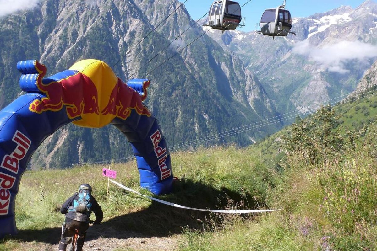 redbull arch with a mountain biker