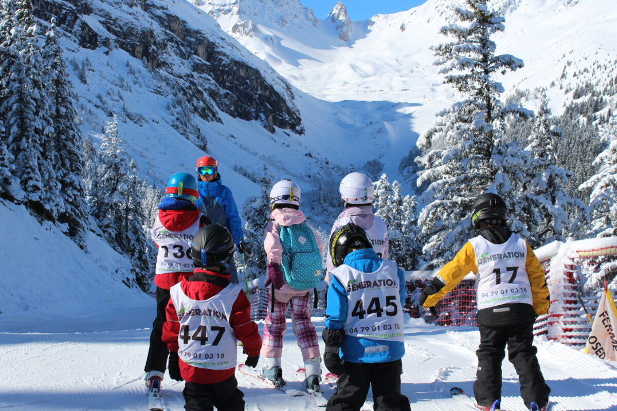 children on a ski lesson