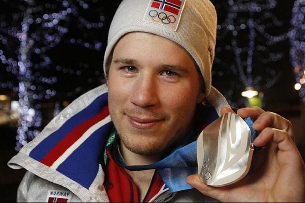a ski racer with a medal