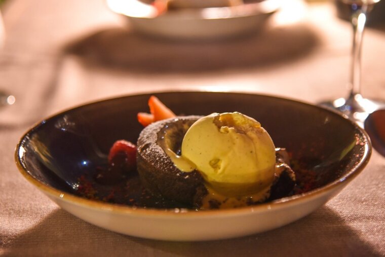 Chocolate coulant filled with raspberry and vanilla ice cream
