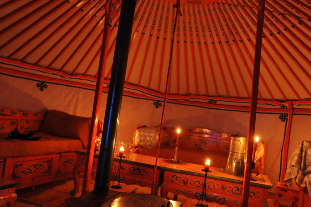 inside of a candlelight yurt in val thorens