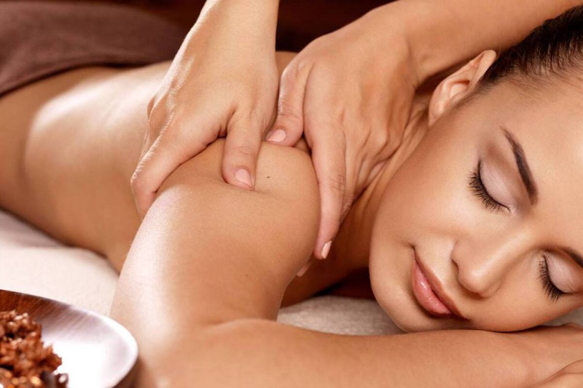 a woman getting a back massage