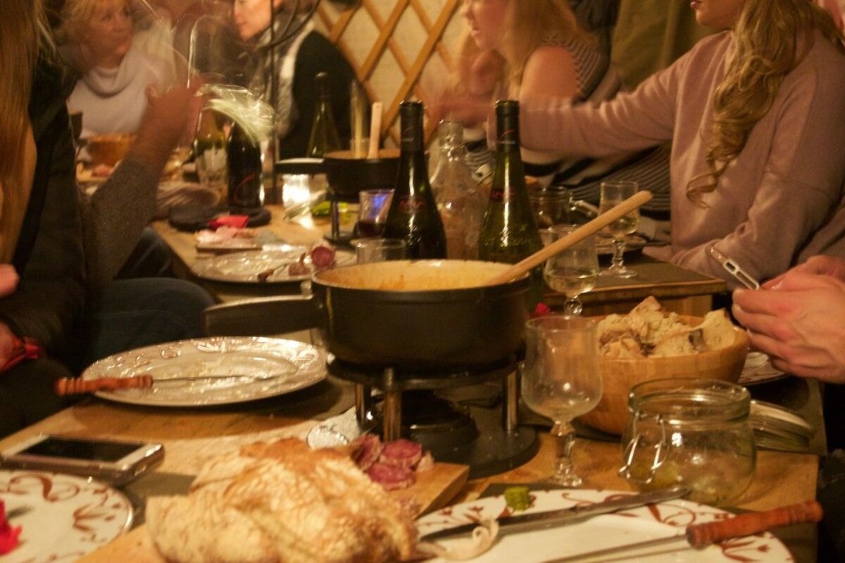 a cheese fondue on the table