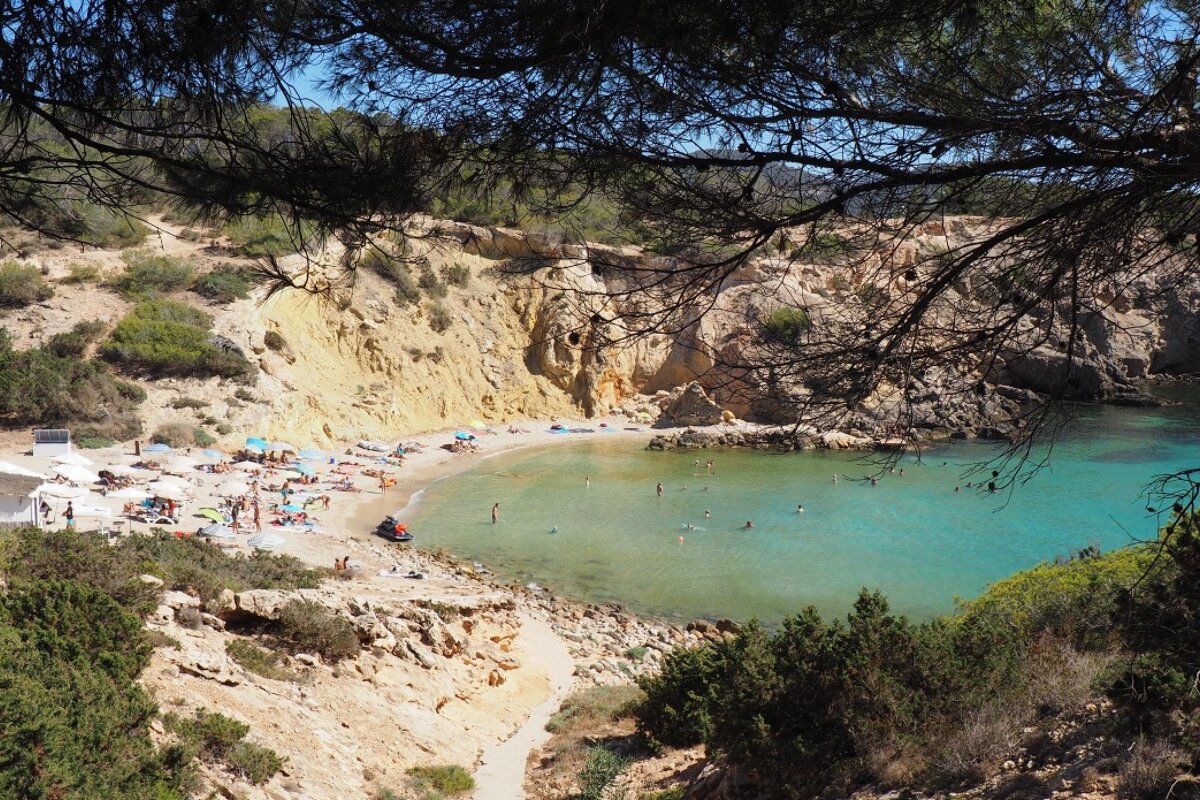 the beautiful cove of cala codolar in south west ibiza