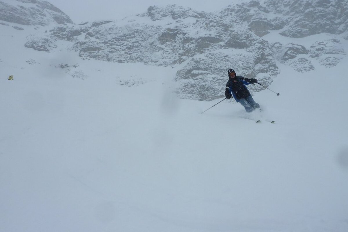 two skiers off piste in val disere