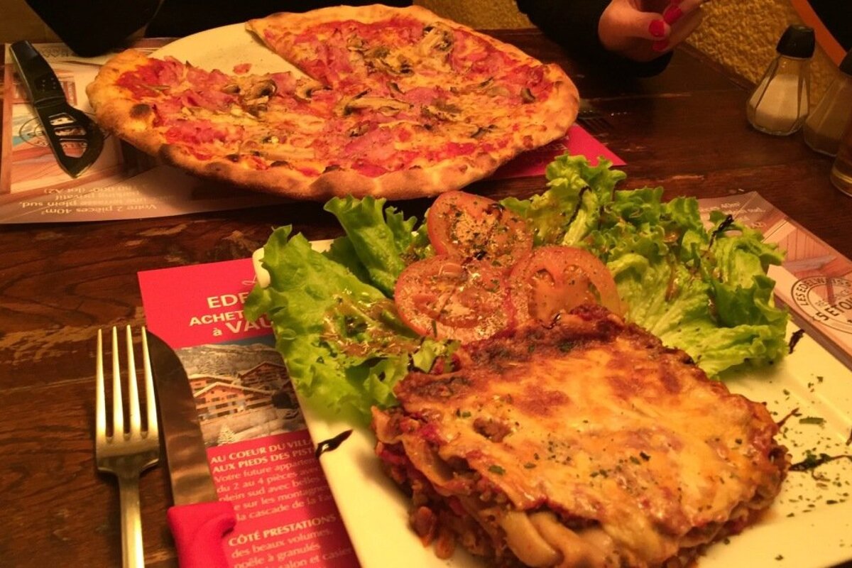 pizza and lasagne in a restaurant in alpe dhuez