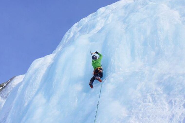 Myself enjoying ice climbing in the sun on Rive Droite, Argentiere