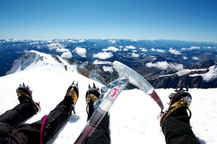 Well earned feet up on the summit of Mont Blanc