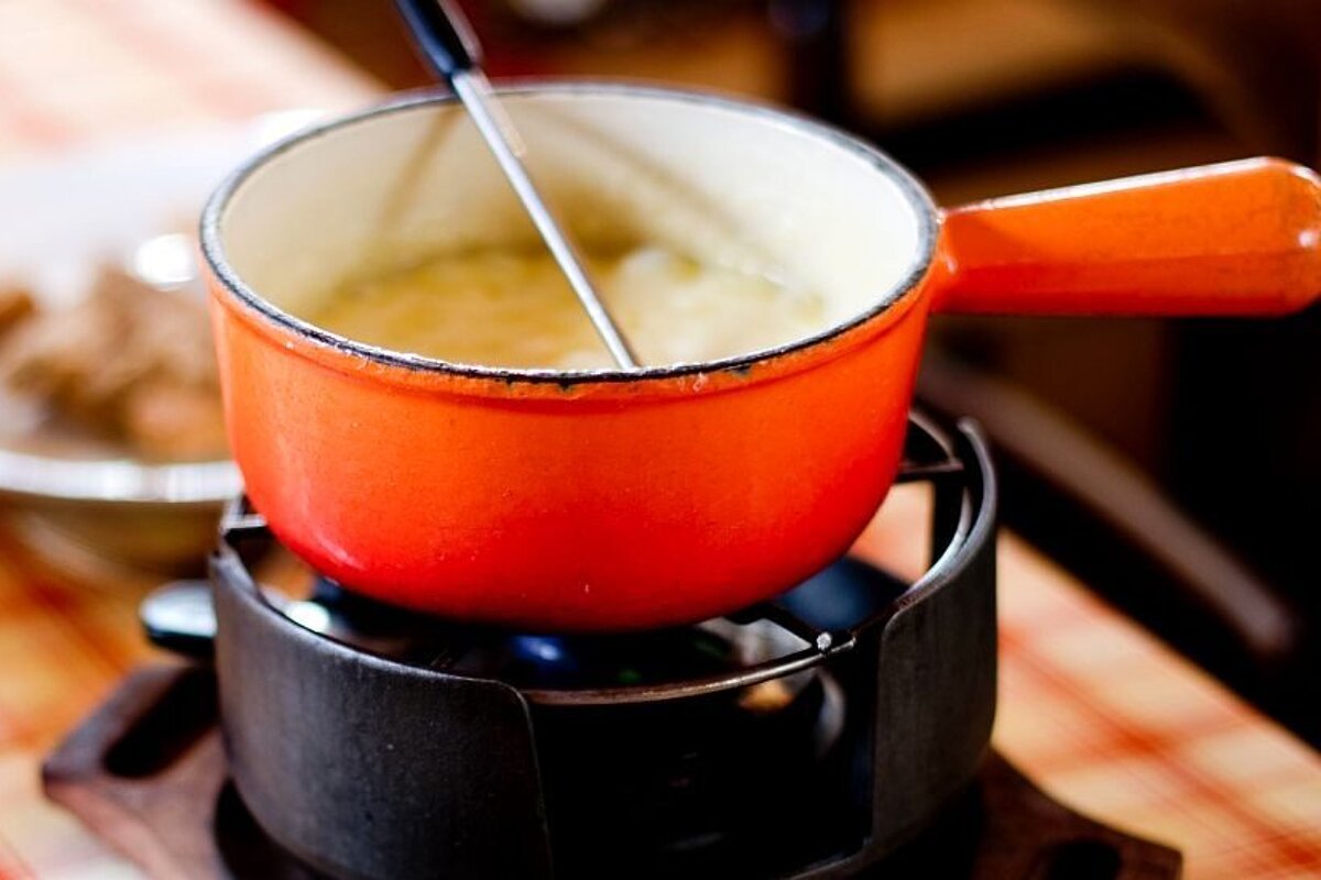 fondue in a red pan